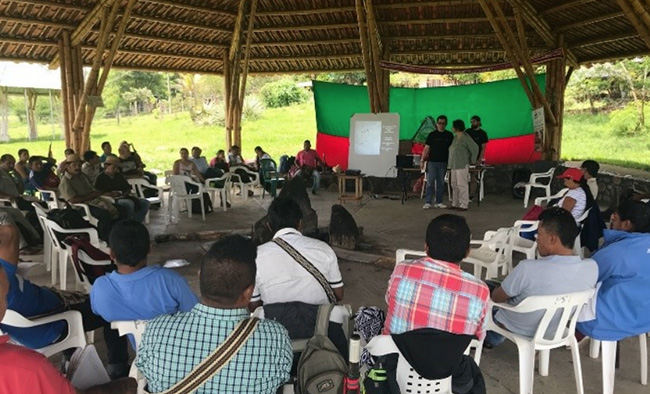 Community meeting of indigenous people discussing the implementation of the 2016 Peace Accord - accountability for peacebuilding