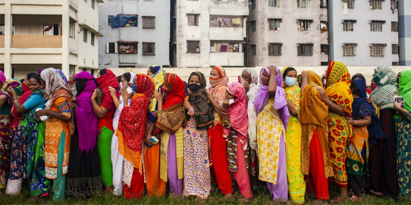 Bangladesh women waiting for relief