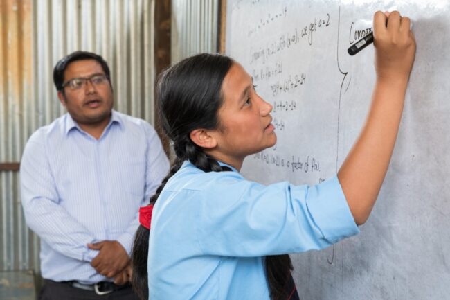 SUCHI GPE Blog Young woman writing on a white board